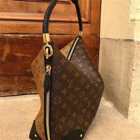 Louis Vuitton Triangle Softy .